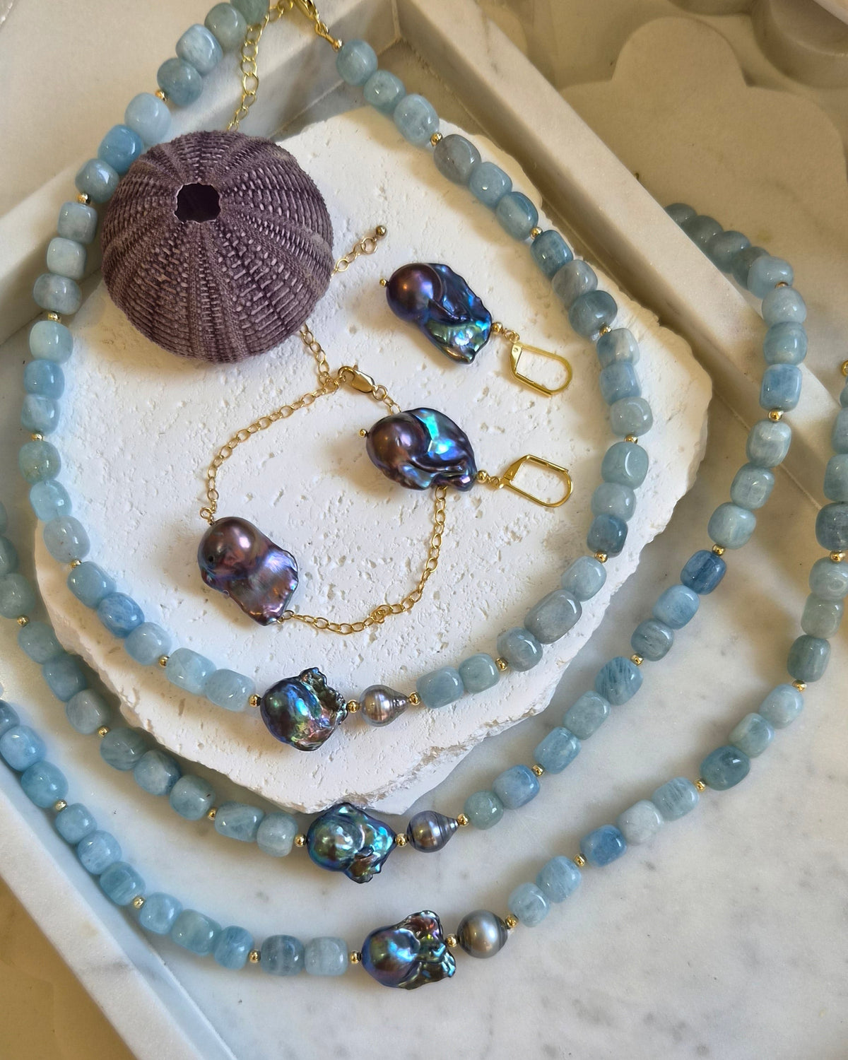 Astra Aquamarine with Tahitian and Freshwater Baroque Grey Pearl Necklace with bracelet and earrings