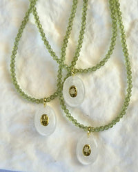 Aurevella Peridot Necklace with Clear Quartz Pendant