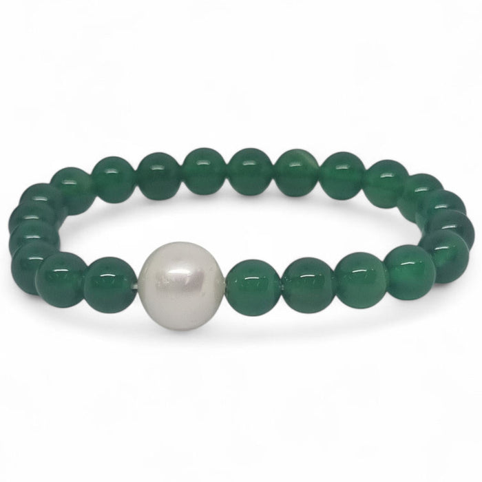 Green beaded bracelet with a white pearl on a white background. Green Onyx and Freshwater Pearl Elastic Bracelet