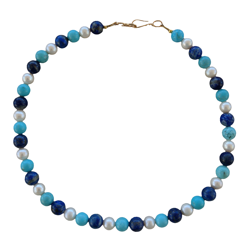 Necklace with lapis lazuli, pearl, and turquoise beads on a white background