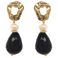 A pair of gold-plated earrings featuring black onyx teardrop shapes and freshwater pearls.