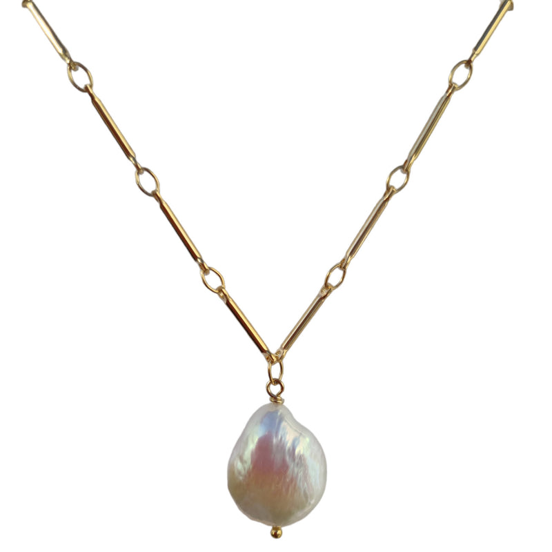 A Tania Keshi Freshwater Pearl bracelet with a gold chain, approximately 16x14mm pearl, and gold-filled or sterling silver headpin.