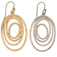 Tilda textured multi oval earrings feature a flowing arrangement of organically shaped ovals with a subtle hammered finish that catches the light beautifully. Available in gold or silver, these earrings offer a modern yet timeless look with a sculptural feel. Lightweight and eye-catching, they’re perfect for adding effortless elegance to both day and evening outfits.