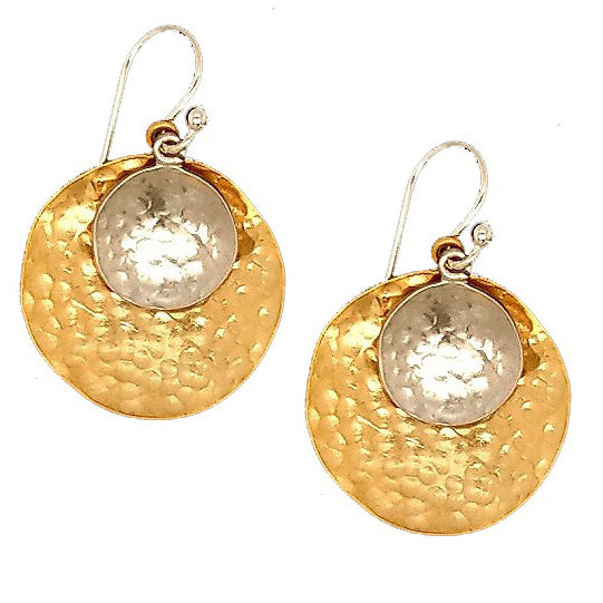The Cora double disc drop earring is a modern classic with a subtle twist. Featuring two sleek, contrasting discs that gently sway with movement, this elegant design is available in gold on silver or silver on gold. The polished finish and clean lines make it a versatile piece, perfect for elevating both casual and formal looks.