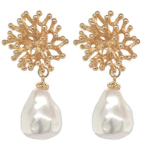 The Coral Reef Faux Pearl Earring is a bold statement piece inspired by the textures and beauty of the ocean. Featuring intricate coral-like detailing and a radiant faux pearl centrepiece, this earring brings an elegant, under-the-sea charm to any look. Lightweight yet eye-catching, it's perfect for adding a touch of coastal glamour to both casual and dressy outfits.