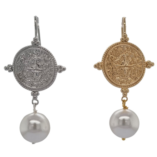 A pair of earrings featuring a gold and silver Greek coin design atop a pearl, presented side by side.