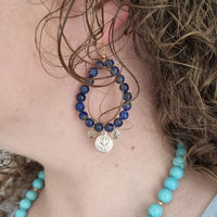 Vera hoop Earrings with Coin drops Lapis Lazuli on model